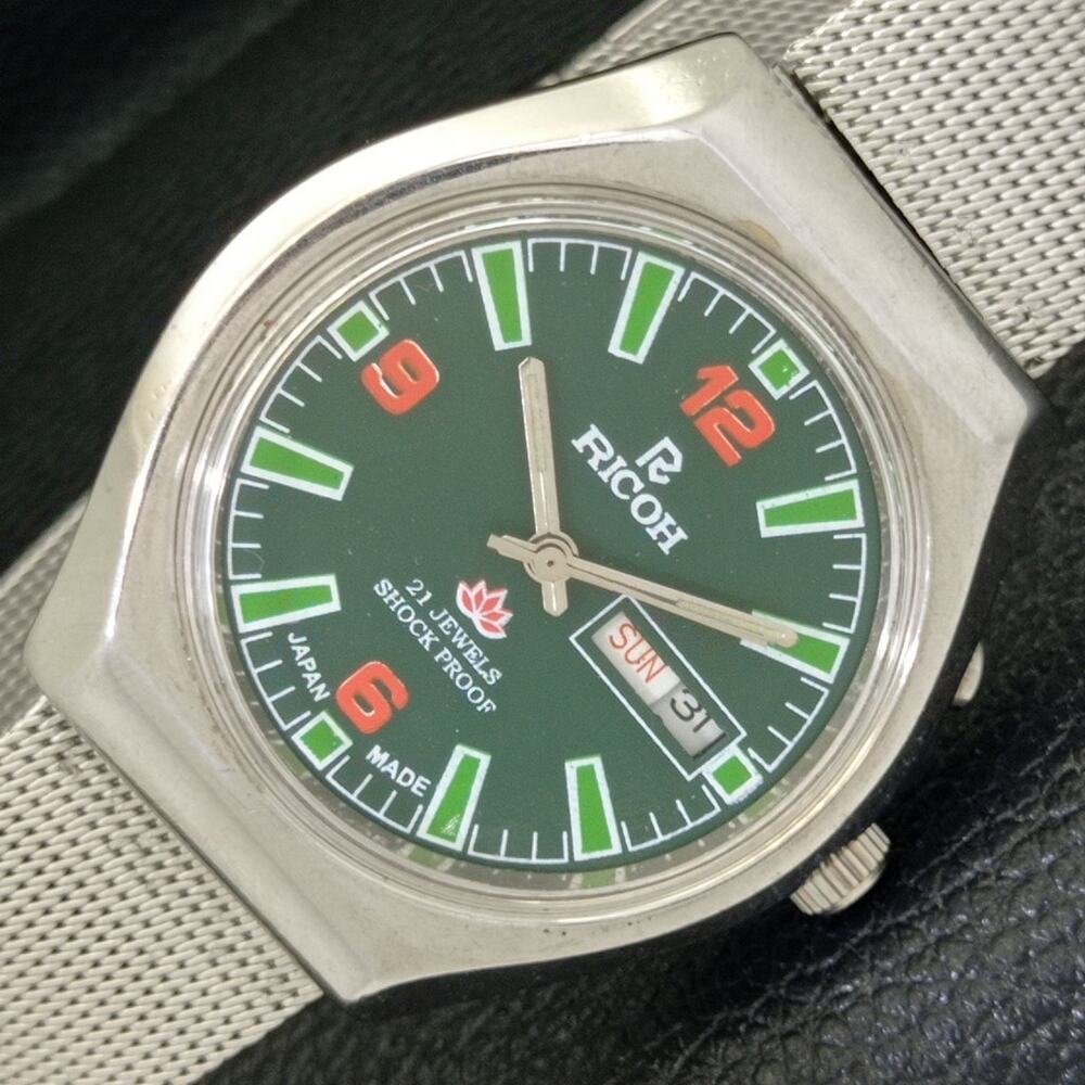 Vintage 1987 Ricoh Automatic Mens Silver Watch W/daydate & Green accents